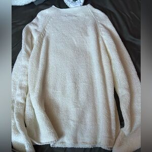 A cozy creamish/white color sweater size L